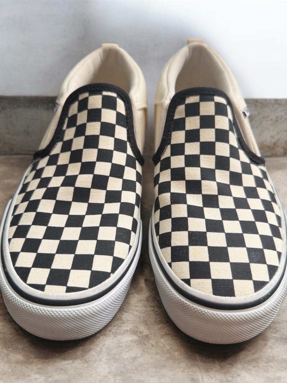 Never worn!  Checkerboard Slip-On Canvas Sneakers - Black & Cream